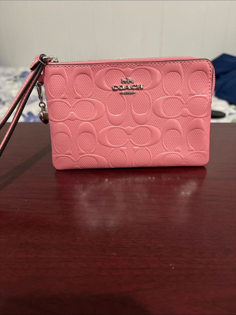 Coach Pink Signature Embossed Wristlet EUC